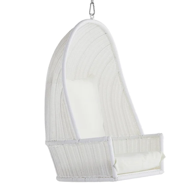 A white hanging chair with a cushion on top of it.