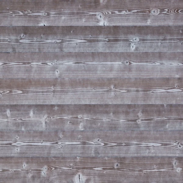 A close up of the wood grain on the wall.