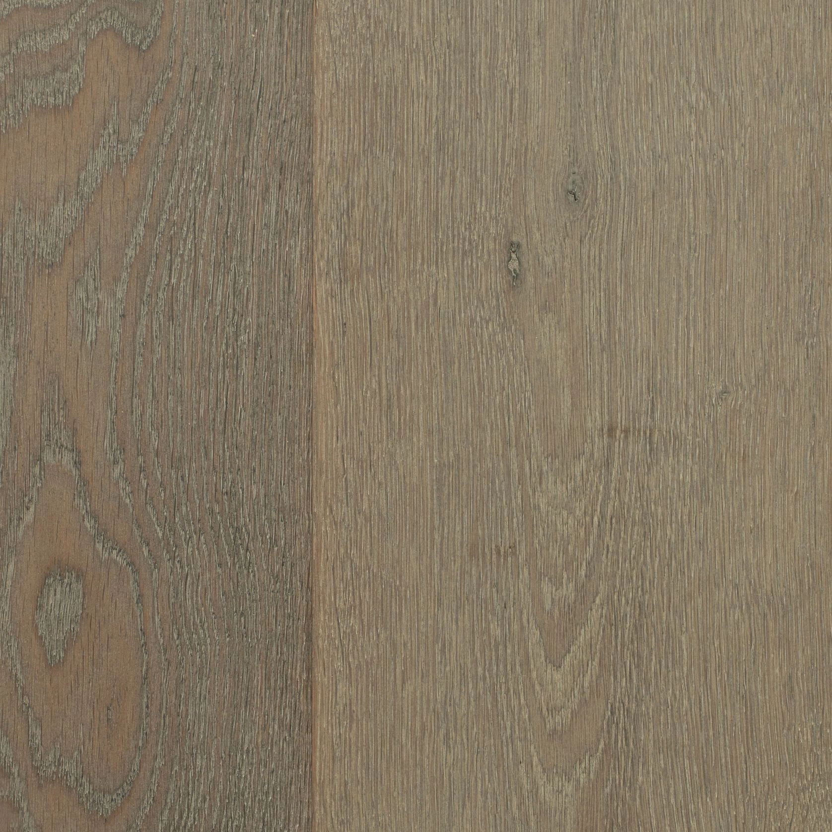 A close up of the wood grain on a floor