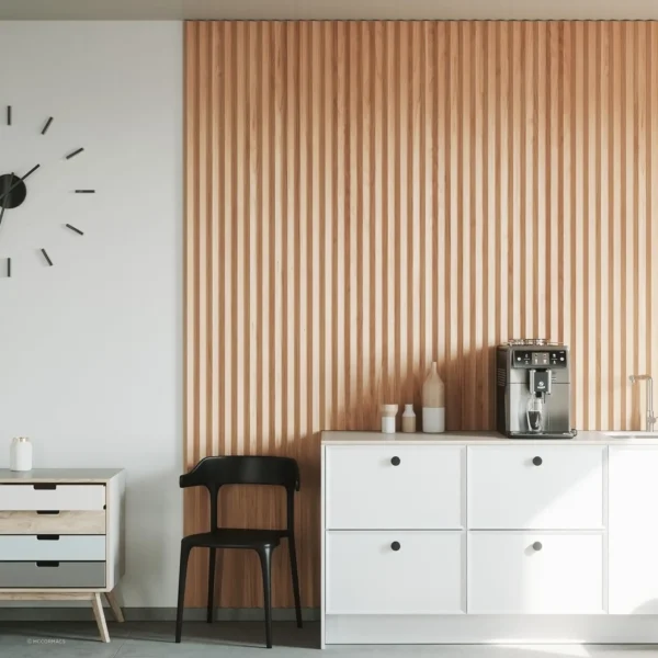 A room with a clock and a wall mounted coffee maker.