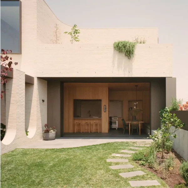 A house with a garden and patio area.