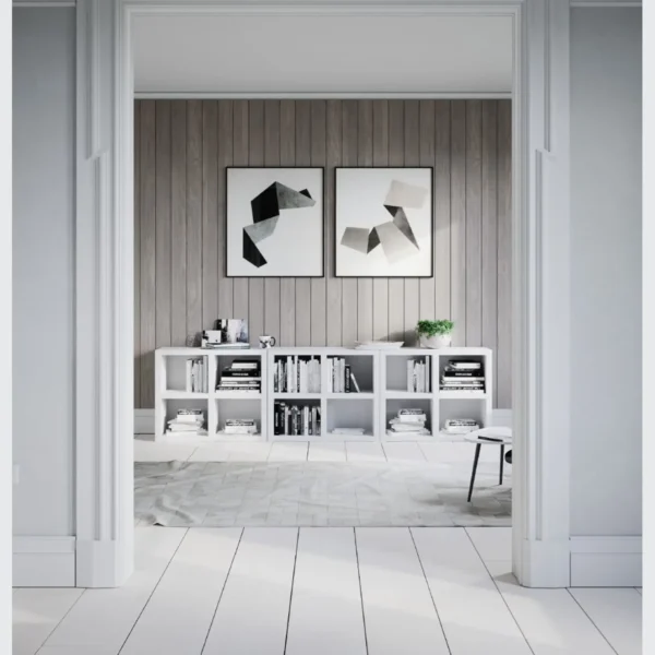 A white room with two pictures on the wall