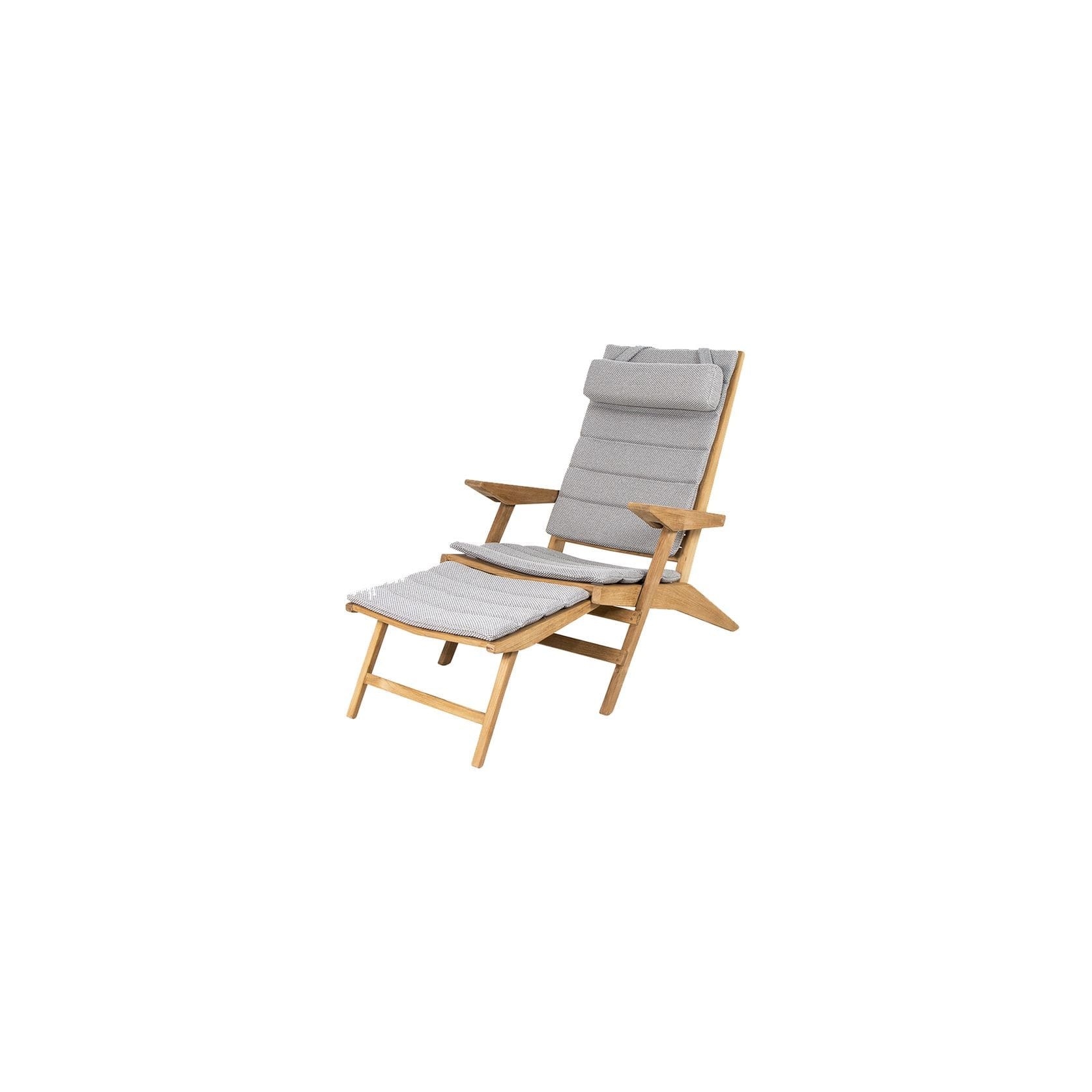 A wooden lounge chair with a foot rest.