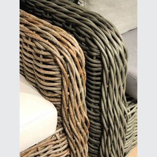 A close up of some wicker baskets on the floor