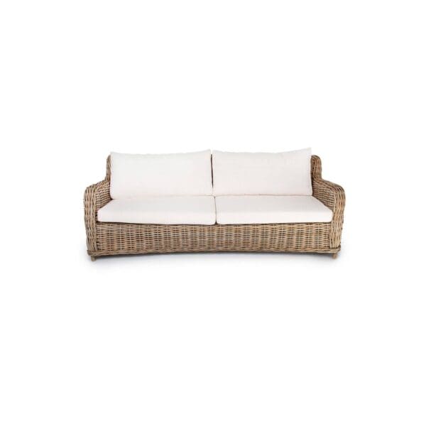 A couch with white cushions on top of it.