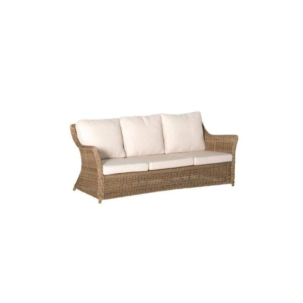 A couch with white cushions on top of it.