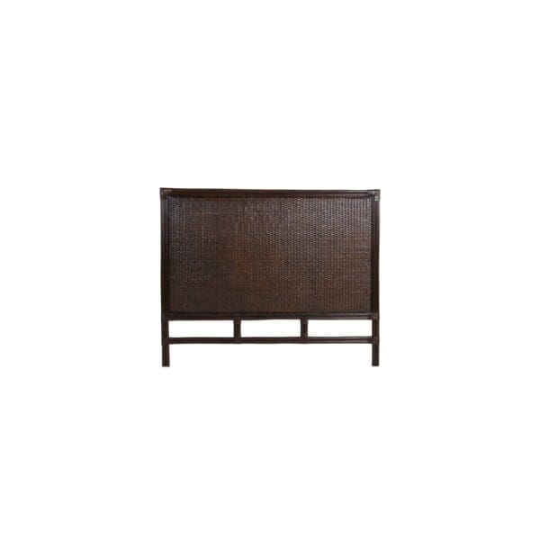 A brown headboard with wooden slats on the side.